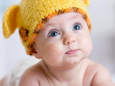 baby with hat that has ears on it