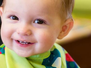 child getting haircut