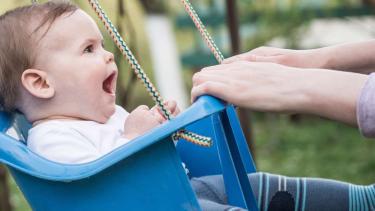 child on swing