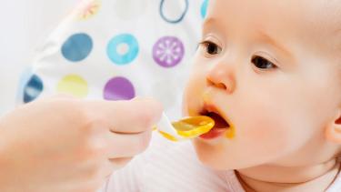 feeding child with a spoon