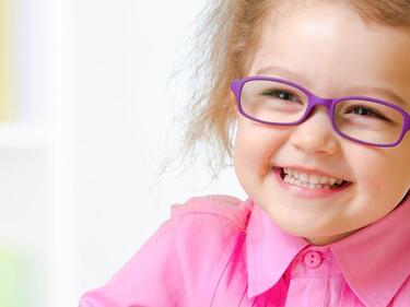 young girl with glasses