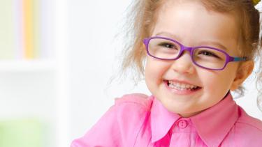 young girl with glasses